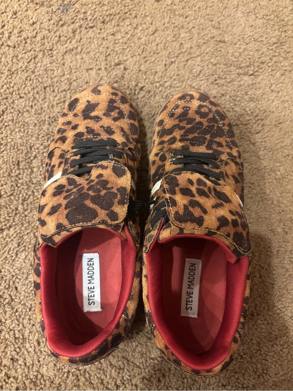 Steve Madden women’s Leopard Print Sneakers with Red Lining